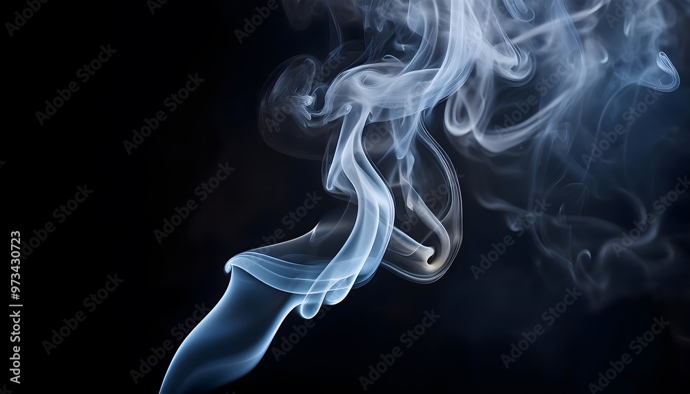 Fototapeta premium Cigarette smoke drifting against a dark background