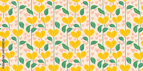 fun-loving, seamless pattern of bright yellow calalilies with mint green leaves on a blush pink heart-patterned background photo