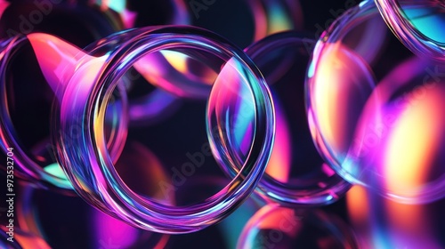 Abstract iridescent glass rings illuminated with vibrant purple and pink light.