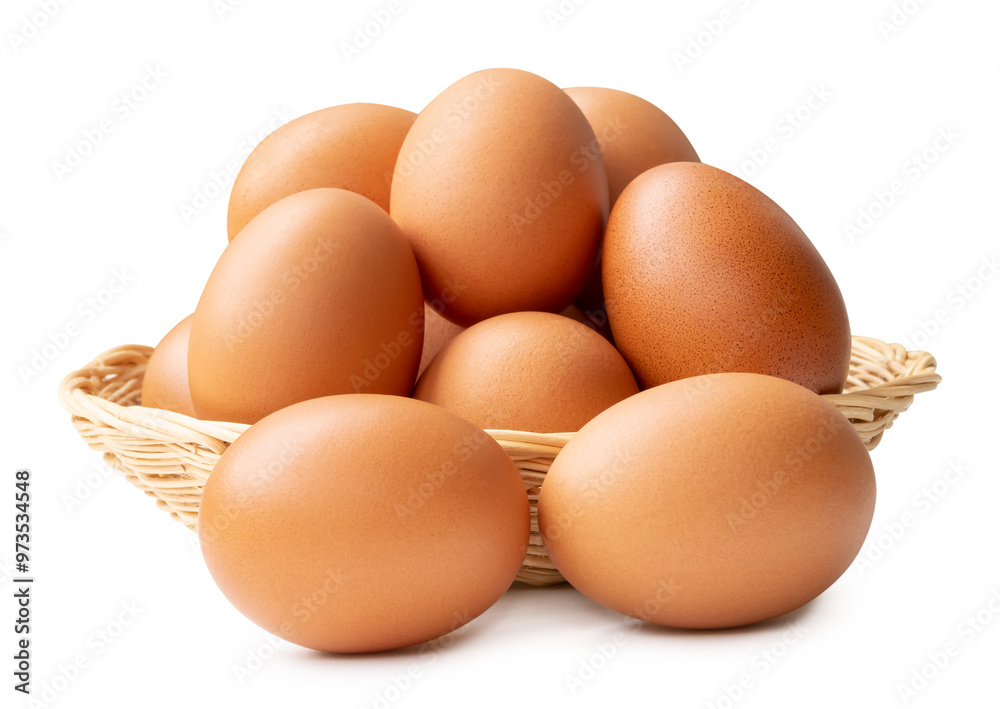 Group of fresh brown chicken eggs in stack in wicker basket isolated on white background with clipping path Group of fresh brown chicken eggs in stack in wicker basket isolated on white background with clipping path