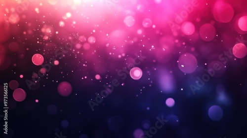 Abstract blurred background with pink, purple and blue bokeh lights.