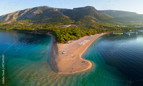 Zlatni Rat beach (Golden Horn beach) is one of the most beautiful beaches in Mediterranean. It is located about 2 km from the town of Bol on the Croatian island of Brac. photo