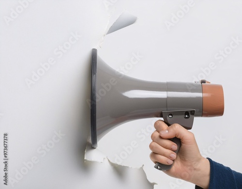 A dynamic image of a hand holding a megaphone, actively announcing sales and discounts, generative ai photo