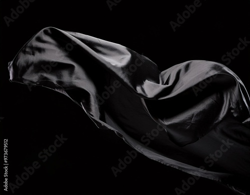 Abstract black fabric flying on a black background, creating a dramatic contrast, generative ai photo