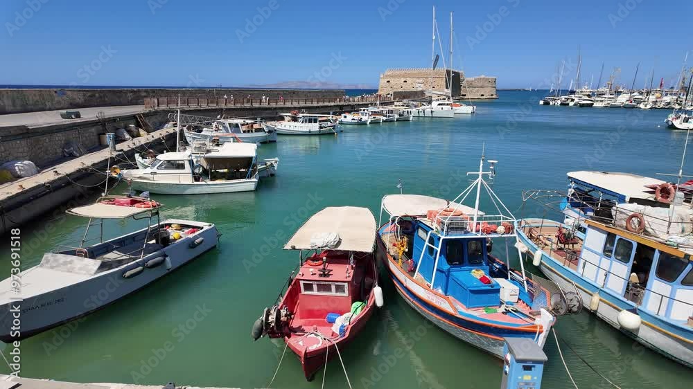 Heraklion Crete Greece. 18.07.2024. Video. Fishing port and colourful fishing boats on the harbour in Heraklion Crete. Heraklion Crete Greece. 18.07.2024. Video. Fishing port and colourful fishing boats on the harbour in Heraklion Crete.