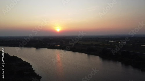 Panoramic aerial video of the Bengawan Solo River at sunset.