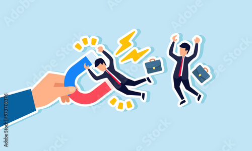 A businessman hand holding a magnet trying to attract employees, illustration of hiring the right professionals who can adapt to the company culture and improve performance and revenue