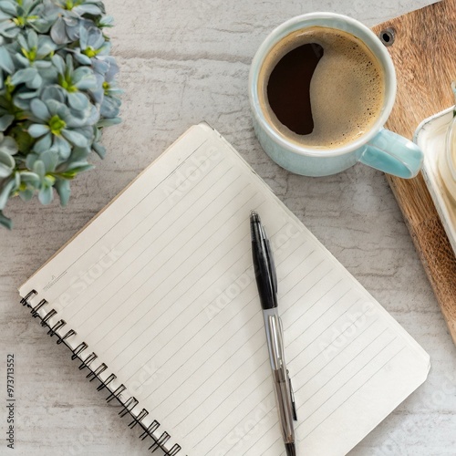 Notebook and coffee