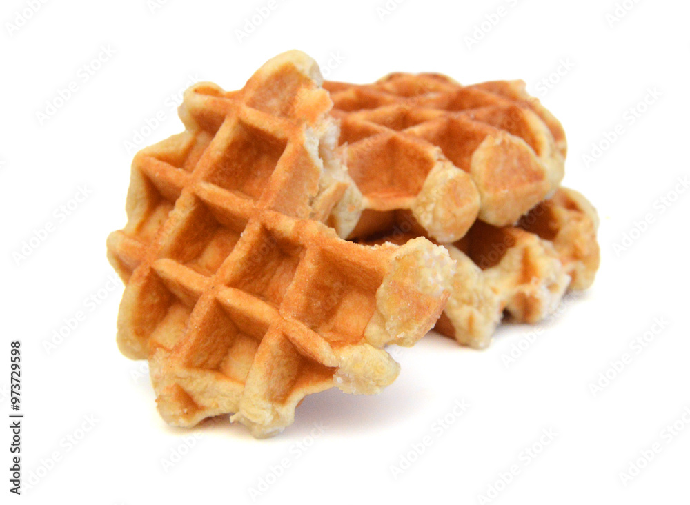 Baked waffles on white background Baked waffles on white background