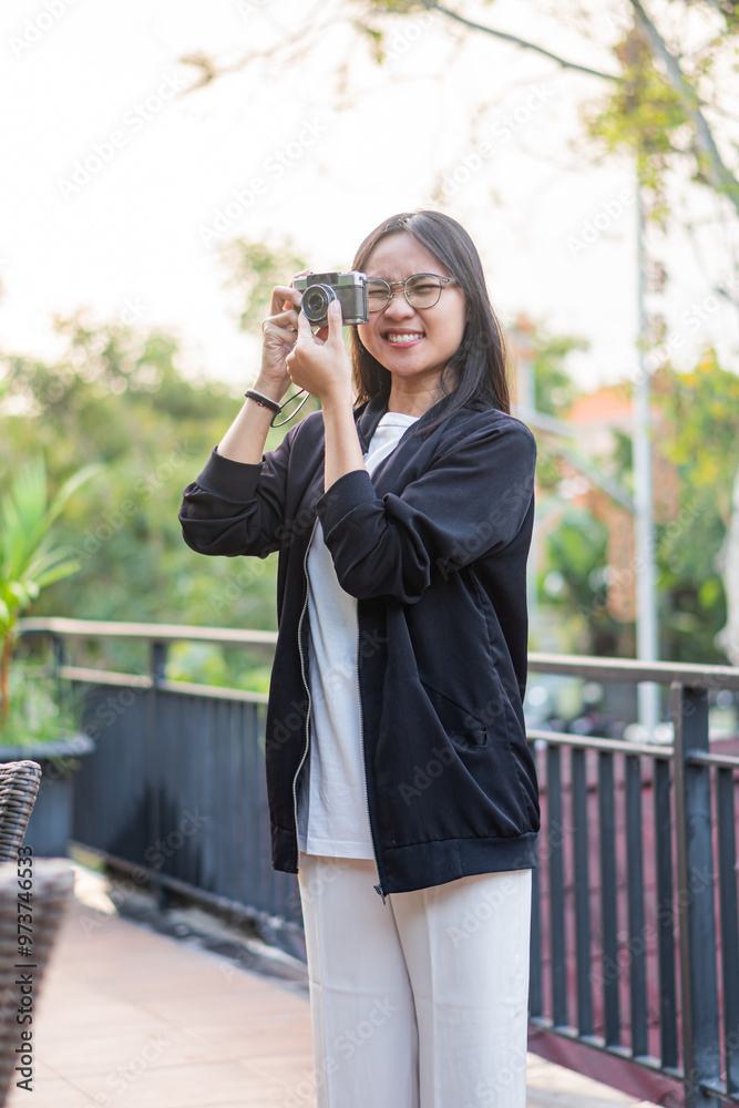 Woman Capturing Scenic View with Camera Woman Capturing Scenic View with Camera