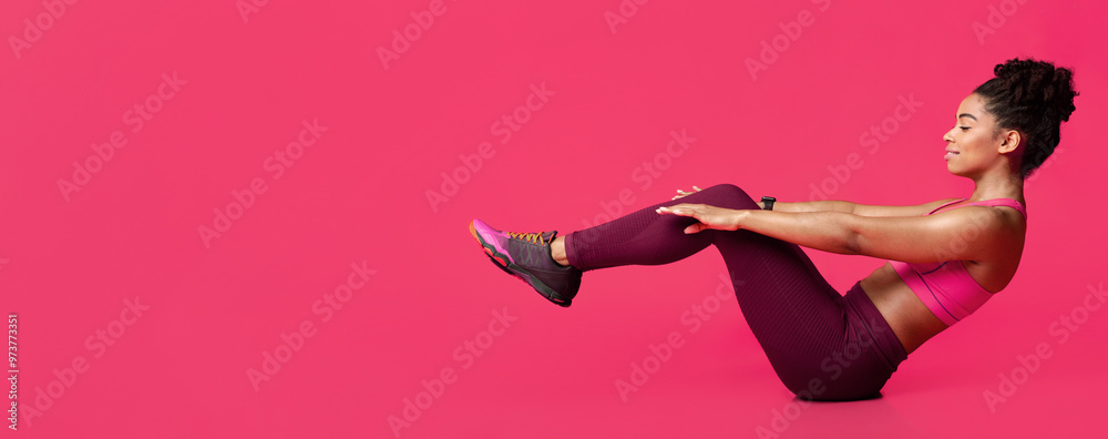 © Prostock-studio - Young sporty afro woman practicing over red background doing crisscross exercise, bicycle crunches pose sitting on floor, copy space © Prostock-studio - Young sporty afro woman practicing over red background doing crisscross exercise, bicycle crunches pose sitting on floor, copy space