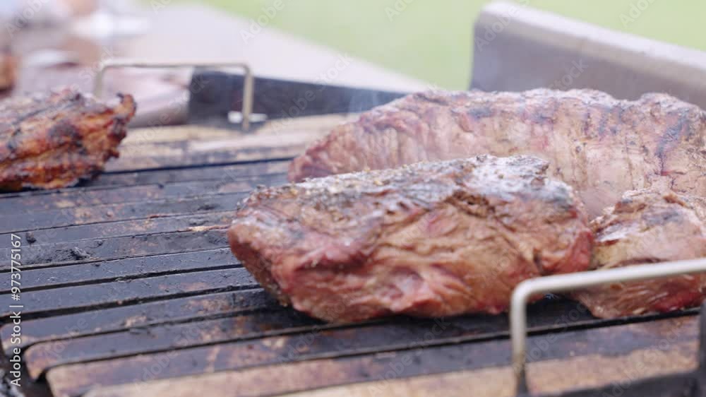 Chef skillfully slicing succulent grilled barbecue meat on a wooden cutting board Chef skillfully slicing succulent grilled barbecue meat on a wooden cutting board