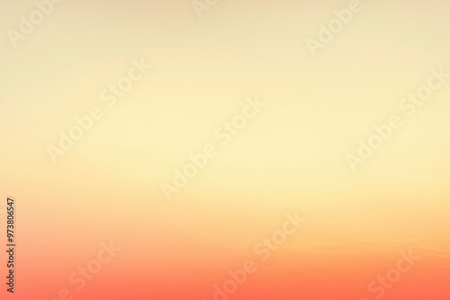 Abstract background with soft pastel colors fading from yellow to orange