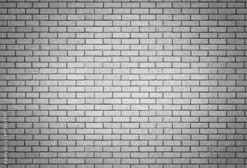White brick wall background texture image. Spotlight on block masonry backdrop surface painted white. Outdoor night time alley scene. Built in traditional running bond brickwork pattern.
