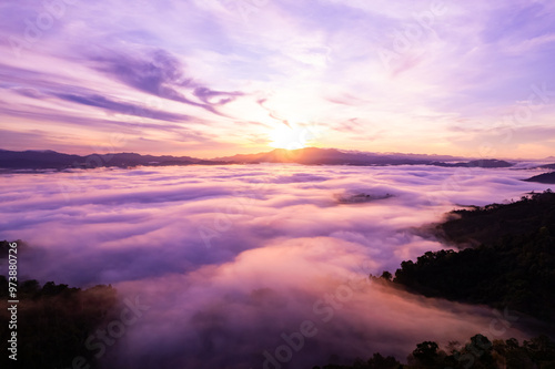 Amazing Sunrise or sunset over mountains hills covered with mist, Aerial view landscape drone shot beautiful colorful nature background