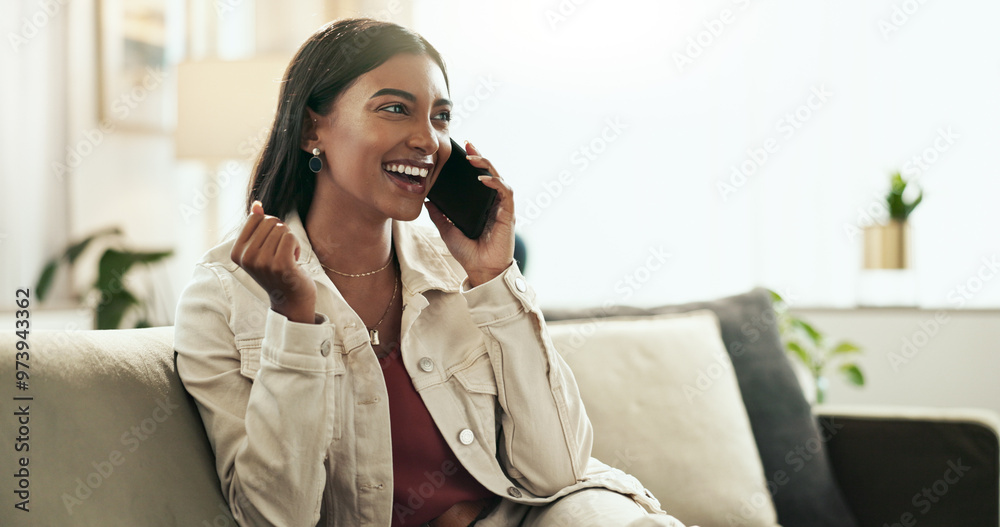 © peopleimages.com - Home, phone call and woman with celebration, smile and communication with network, excited and wow. Person, apartment and girl on sofa, smartphone and cheering with positive news, winner and success
