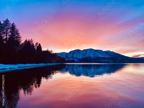 Obraz na płótnie Bright pink sunset over mountains reflecting on lake tahoe