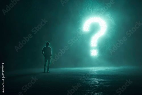 Silhouette of a person standing in front of a glowing question mark in a dark room.