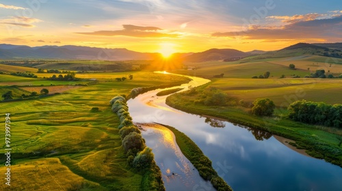 sunset casting a golden hue over a quiet rural landscape, with a winding river reflecting the warm light and gently rolling hills in the distance, with plenty of copy space for text