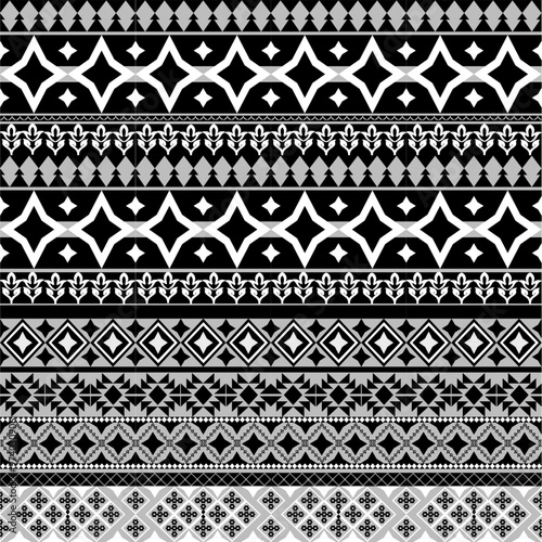 Black and white geometric patterns that are traditional, ethnic, Navajo, or Native American Indian. designs for clothing, curtains, carpets, sarongs, Hmong, and fabric edges.