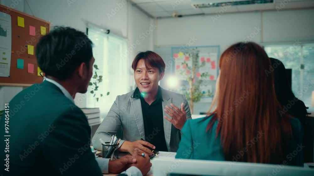 Businesspeople engage in a discussion with a manager during a meeting in a startup office, focusing on project details and strategies for collaboration and success Businesspeople engage in a discussion with a manager during a meeting in a startup office, focusing on project details and strategies for collaboration and success