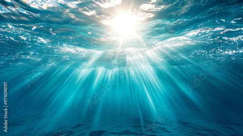 A beautiful blue ocean with sunlight shining through the water