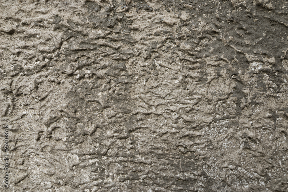Grey textured concrete wall background Grey textured concrete wall background