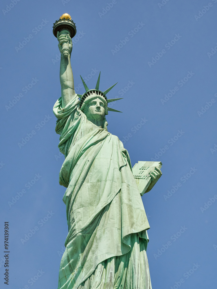 Fototapeta premium The Statue of Liberty Enlightening the World. Usa National Monument. Recognized as a universal symbol of freedom and democracy. National Park Service.