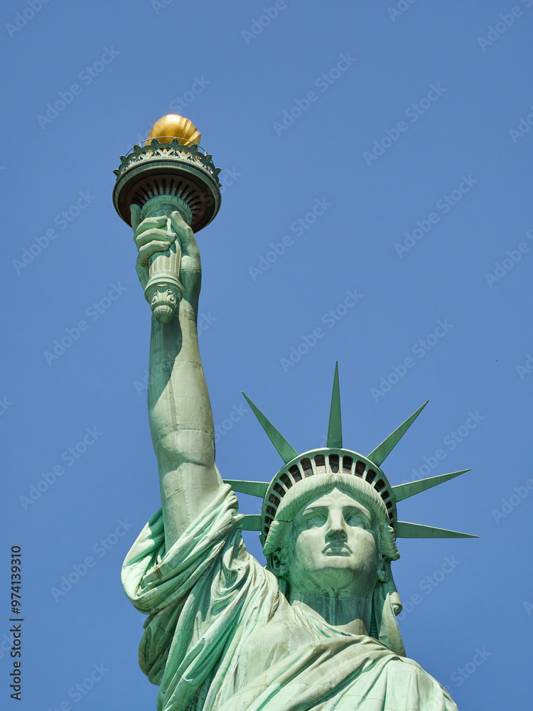 Fototapeta premium The Statue of Liberty Enlightening the World. Usa National Monument. Recognized as a universal symbol of freedom and democracy. National Park Service.