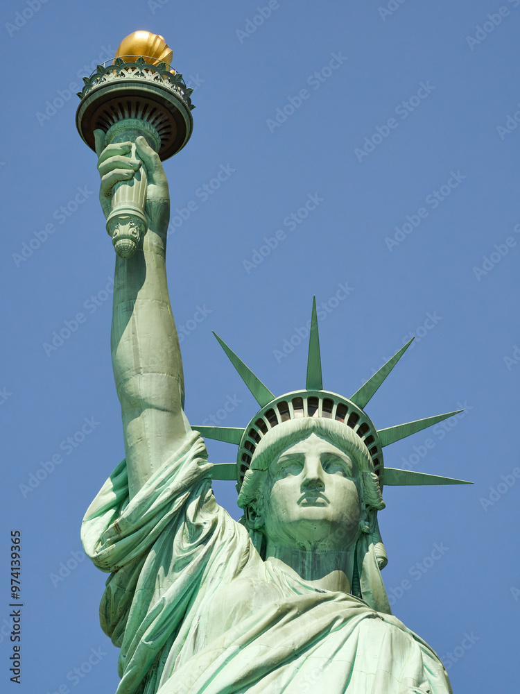 Fototapeta premium The Statue of Liberty Enlightening the World. Usa National Monument. Recognized as a universal symbol of freedom and democracy. National Park Service.