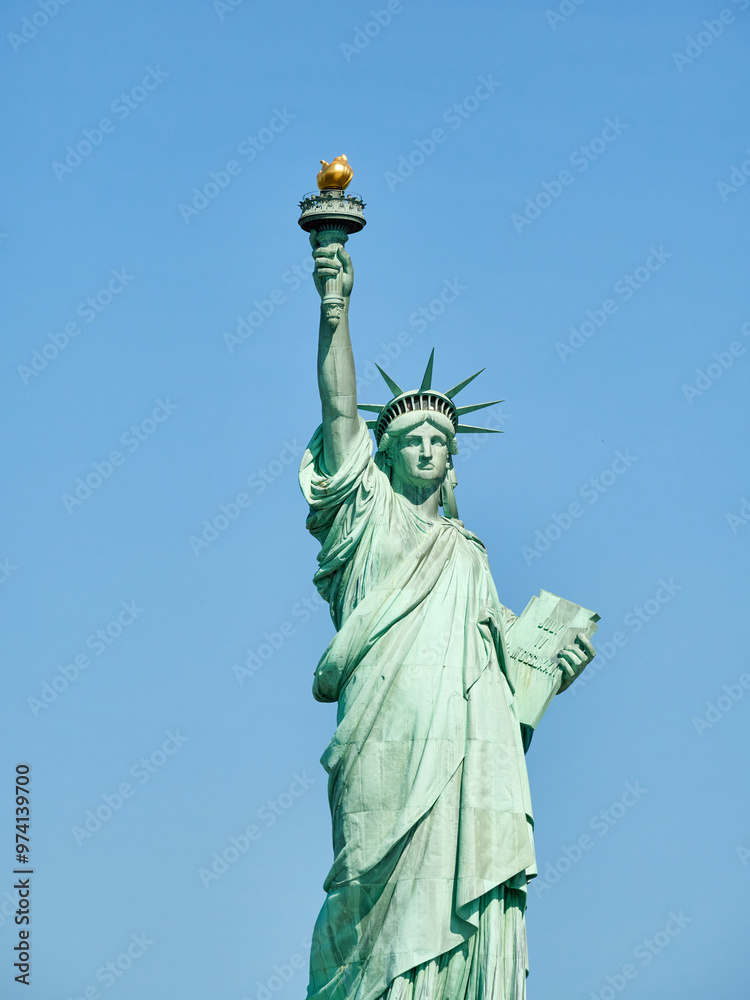 Fototapeta premium The Statue of Liberty Enlightening the World. Usa National Monument. Recognized as a universal symbol of freedom and democracy. National Park Service.