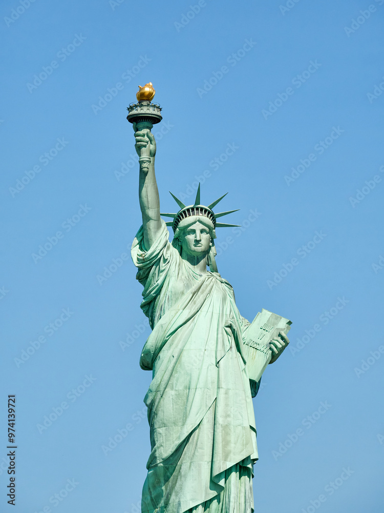 Fototapeta premium The Statue of Liberty Enlightening the World. Usa National Monument. Recognized as a universal symbol of freedom and democracy. National Park Service.