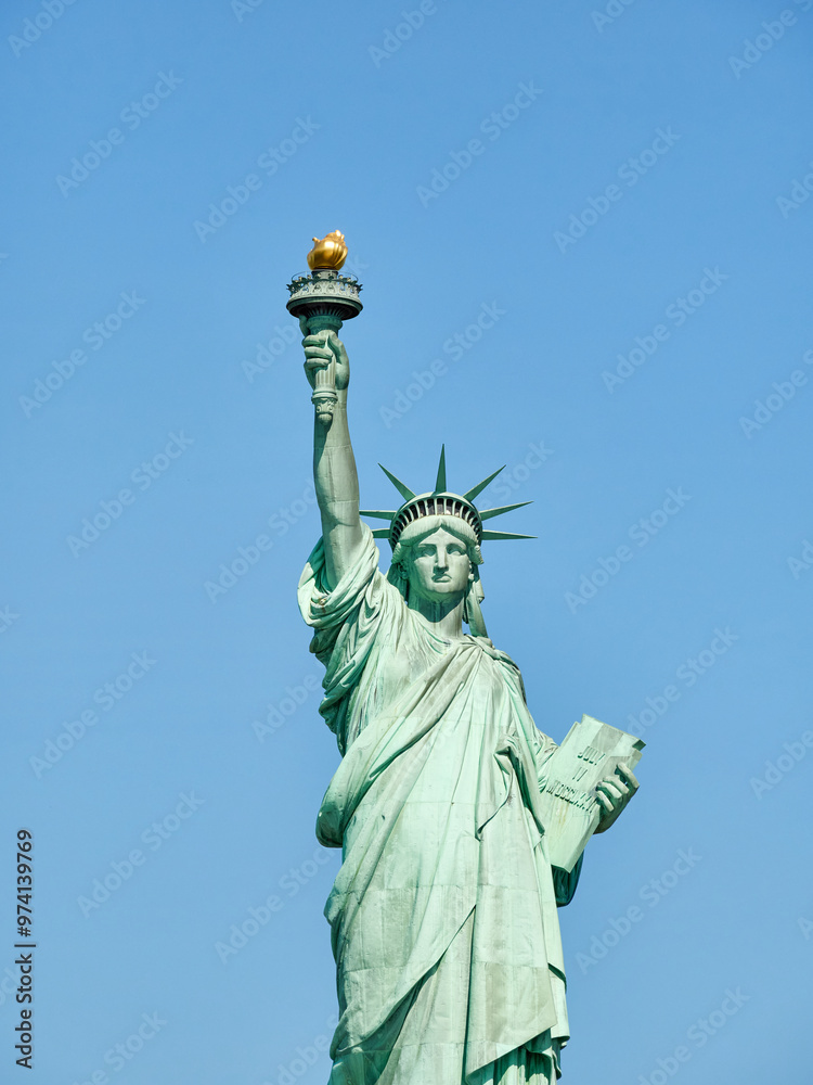 Fototapeta premium The Statue of Liberty Enlightening the World. Usa National Monument. Recognized as a universal symbol of freedom and democracy. National Park Service.