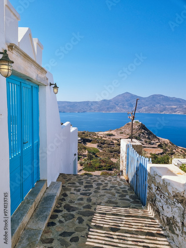 Panoramic view to the Aegean and Greek traditional white houses with from Plaka village, Milos island, Cyclades, Greece