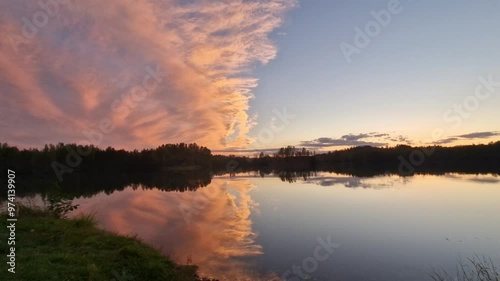 Wonderful sunset on the lake with beautiful clouds.