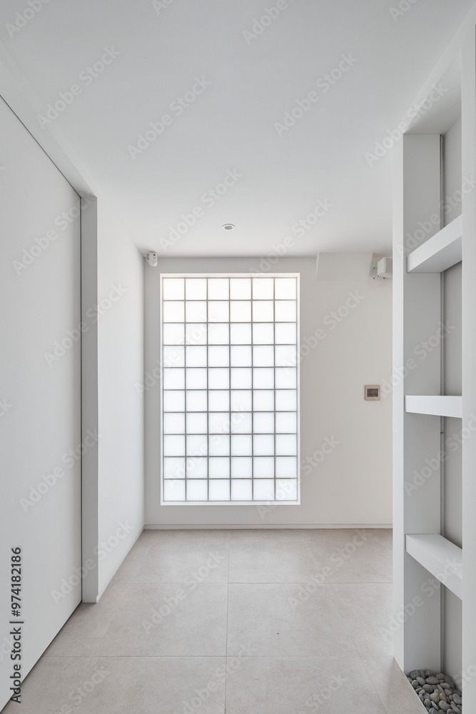 Fototapeta premium Minimal White Room with Glass Block Window, Soft Light Interior