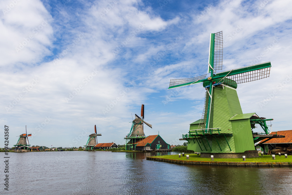 Dutch windmills along the Zaanse Schans in Zaandijk, Netherlands Dutch windmills along the Zaanse Schans in Zaandijk, Netherlands