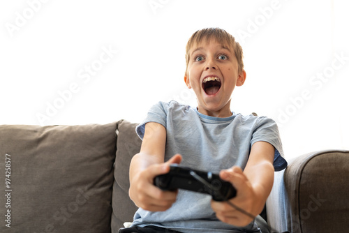 A child with an excited expression while playing video game