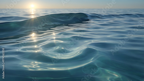 A tranquil coastal scene, with gentle waves rolling onto the shore – a scene that exudes serenity and natural beauty with partly cloudy skies and the warm glow of the rising or setting sun.