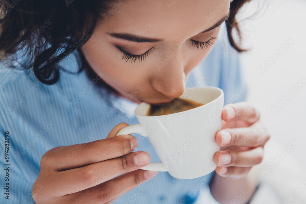 Photo of sweet dreamy lady assistant wear shirt drinking morning beverage indoors workplace workstation Photo of sweet dreamy lady assistant wear shirt drinking morning beverage indoors workplace workstation
