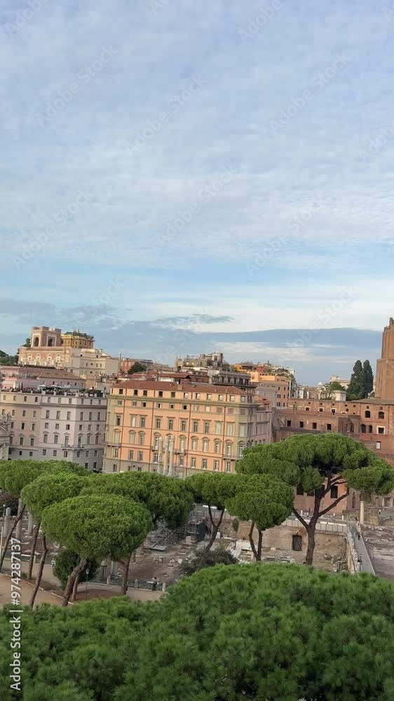 Evening panorama from the roof of Vittoriano to the old city of Rome with the Forum and the Colosseum Evening panorama from the roof of Vittoriano to the old city of Rome with the Forum and the Colosseum