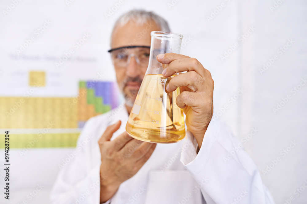 Man, scientist and beaker with chemical compound for experiment, liquid or medical breakthrough at laboratory. Mature male person, biologist or chemist with fluid for science results or exam at lab Man, scientist and beaker with chemical compound for experiment, liquid or medical breakthrough at laboratory. Mature male person, biologist or chemist with fluid for science results or exam at lab