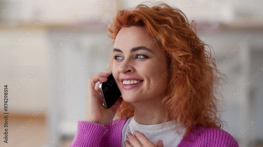 Happy smiling carefree Caucasian woman lady girl indoors at home female talking mobile phone talk smartphone laughing friendly conversation good news laugh excited communicate cellphone speaking call Happy smiling carefree Caucasian woman lady girl indoors at home female talking mobile phone talk smartphone laughing friendly conversation good news laugh excited communicate cellphone speaking call