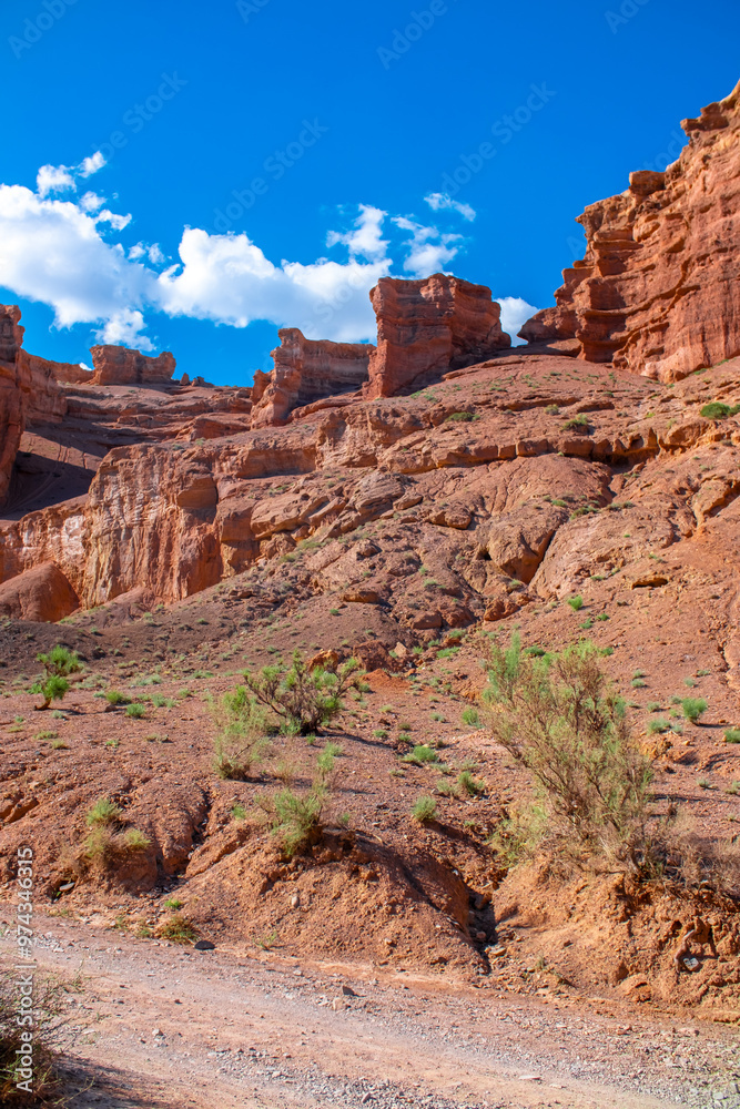 Charyn Canyon, Valley of Castles. The excellence of Kazakhstan. Panorama of natural unusual landscape. The red canyon of extraordinary beauty looks like a Martian landscape. Charyn Canyon, Valley of Castles. The excellence of Kazakhstan. Panorama of natural unusual landscape. The red canyon of extraordinary beauty looks like a Martian landscape.