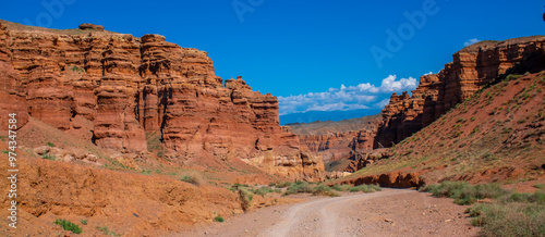 Charyn Canyon, Valley of Castles. The excellence of Kazakhstan. Panorama of natural unusual landscape. The red canyon of extraordinary beauty looks like a Martian landscape. photo