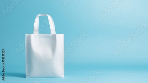 White Tote Bag on Blue Background