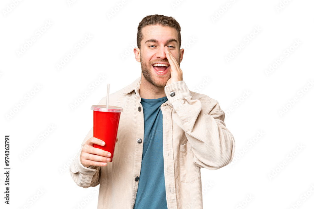 Young handsome blonde man holding soda over isolated chroma key background shouting with mouth wide open