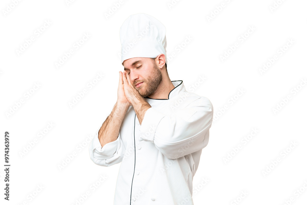 Young blonde man Chef over isolated chroma key background making sleep gesture in dorable expression Young blonde man Chef over isolated chroma key background making sleep gesture in dorable expression