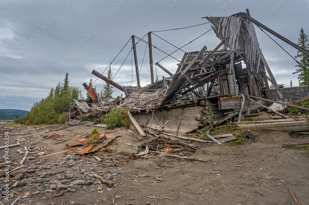 Remains of a riverboat wreck on the banks of the Yukon River at Dawson City, Yukon, Canada Remains of a riverboat wreck on the banks of the Yukon River at Dawson City, Yukon, Canada