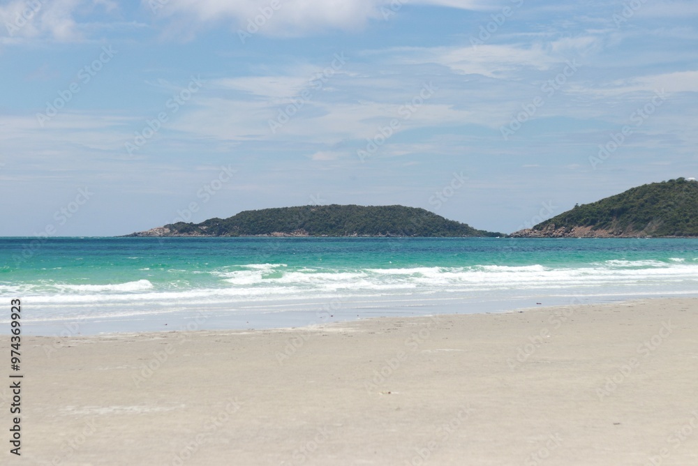 A small island in the middle of the sea. A small island in the middle of the sea.